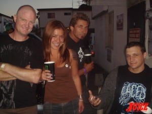 Sara Long, Ed Reategui and Jake Brown hangin out back.