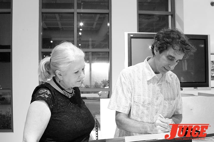 Glen E. Friedman signing books. Photo by Dan Levy.