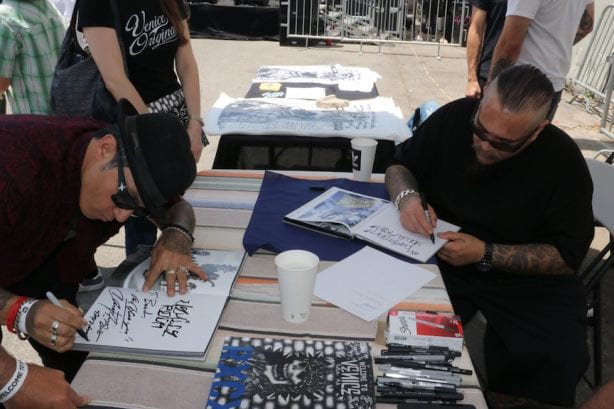 Christian Hosoi and Ric Clayton signing copies of "Welcome To Venice". Photo by Kelly Jackson